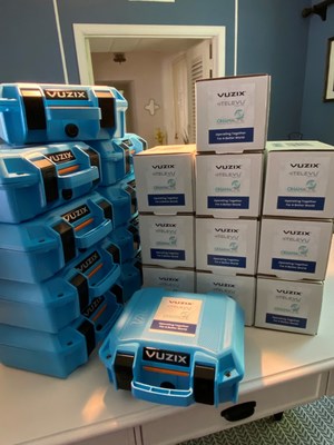 Boxes of smartglasses donated by Vuzix to aid medical providers in Ukraine. Image provided by Vuzix.